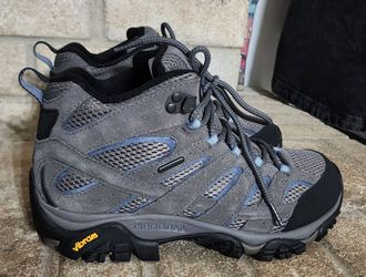Merrell Women's Moab 2 Mid Waterproof hiking boots in the Granite gray colorway.
