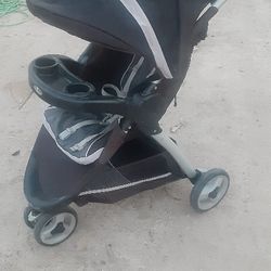 Black And Gray Graco Stroller 