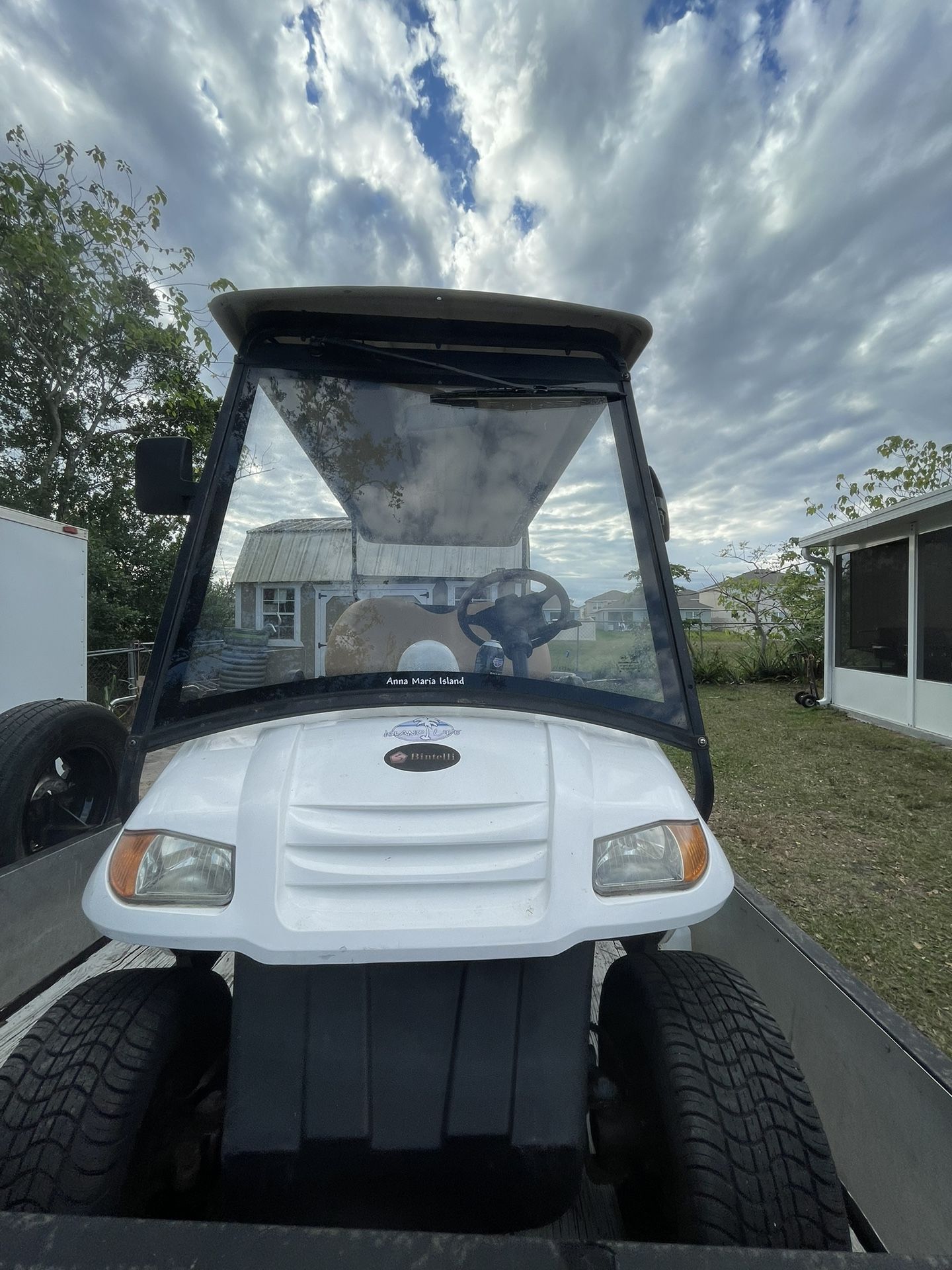 Brand-Bintelli Gold Cart. Model- Electric. Year-2018 Color-White. Size-12ft