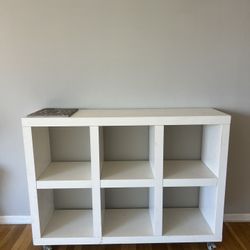 White Storage Shelf on Wheels