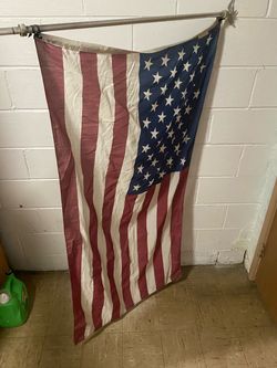 Vintage American Flag (Tattered and Worn) with Eagle Topper Flag Pole