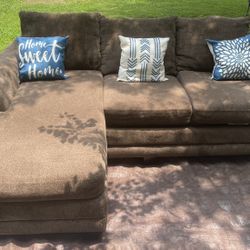 Dark brown smaller sectional couch 