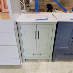 24 in Single Sink Bath Vanity in Sage Green with Vanity Top in White  $349 