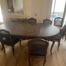 Antique table made in Italy with two leafs and eight chairs two styles