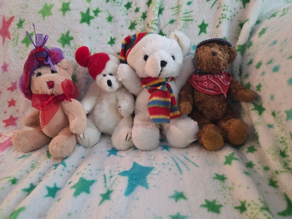 4 Small Teddy Bears With Clothes