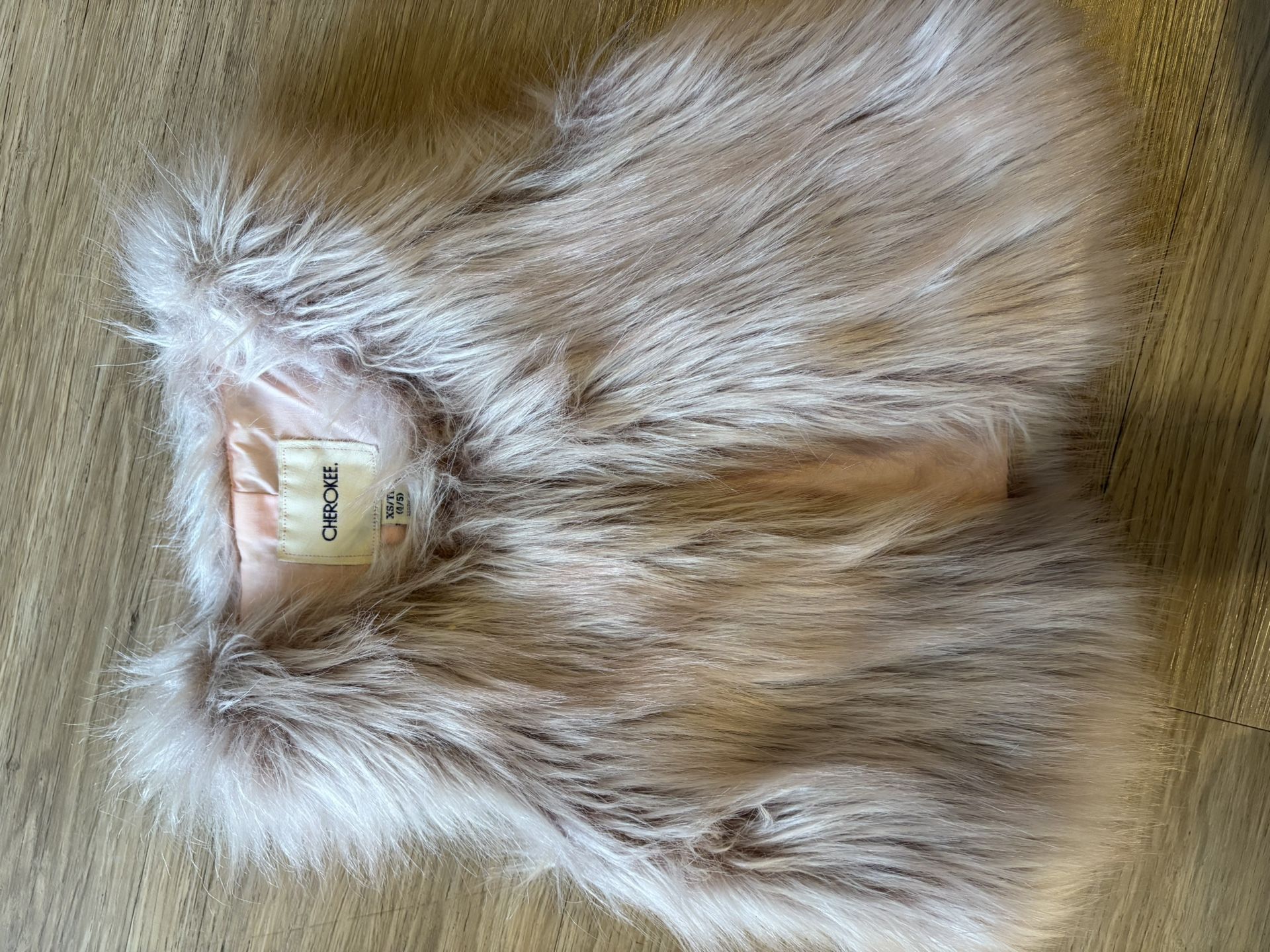 fur vest size 5