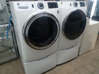 GE front load washer and dryer set on pedestals - Free delivery