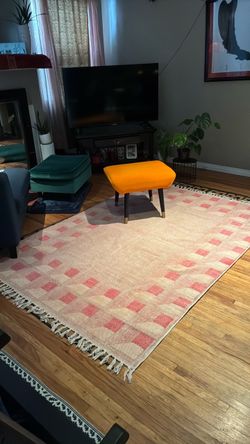 Pink Checkered Area Rug with Fringe