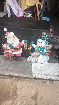 Santa and.  Snow man stand
