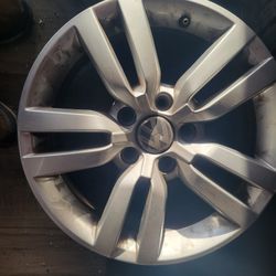 4 USED 16 INCH V.W. WHEELS