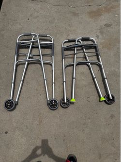 2 ELDERLY WALKERS