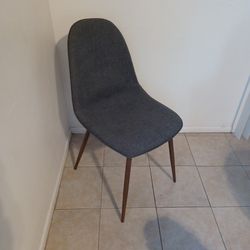 Gray Upholstered chair with metal legs. can used for dining, livingroom, bedroom, desk $20