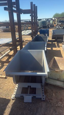 Self dumping hoppers