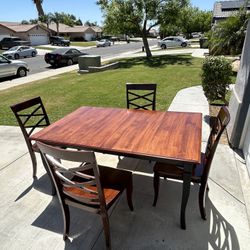 Great Table with extension and 4 chairs