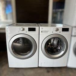 Kenmore washer and electric dryer set.