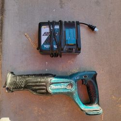 Makita Saw and charger.