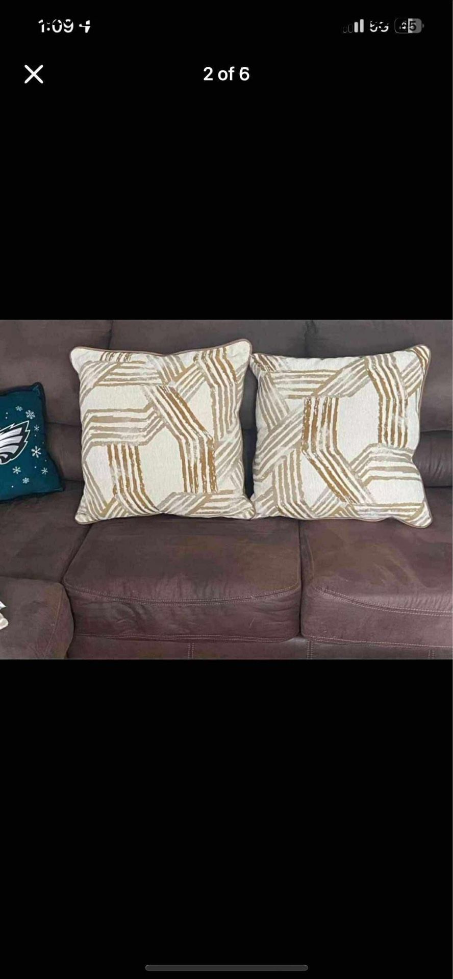 PILLOWS - 2 Brown/Tan Design on front Brown fake leather on other side $25 19082