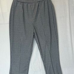 Ultra Flirt white ribbed tank top and black and white checked flare pants 