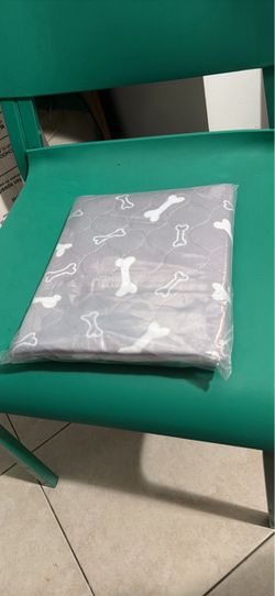 One Unopened reusable puppy pad