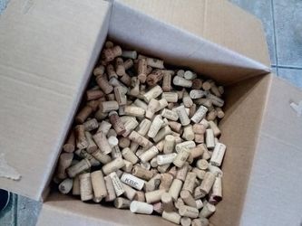 over 1000+ box of wine corks for arts and crafts project.