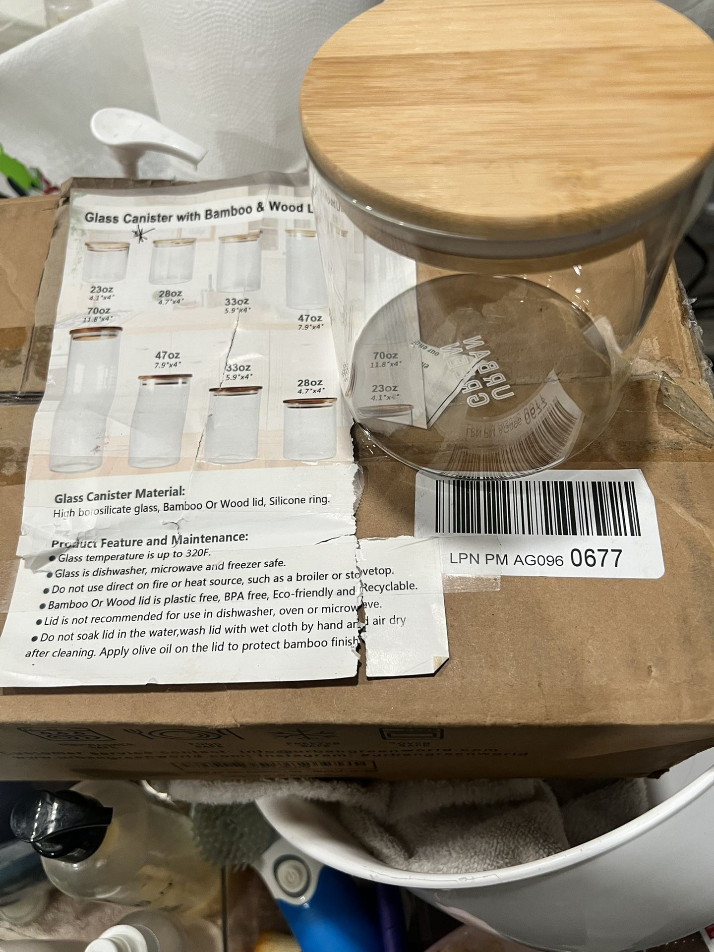 23 oz Clear glass canister with a bamboo lid. Perfect for storage. Box of 6