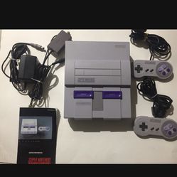 Super Nintendo With 8 Games 2 Controllers and Instruction Manual