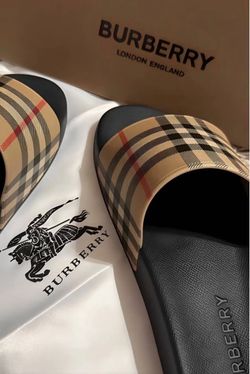 Black Burberry slides