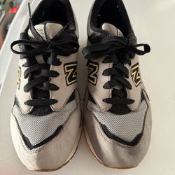 New Balance 1600 sneakers in the 'Grey Black Gold' colorway from the Lost World Collectio