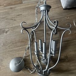 1 brushed nickle Chandelier ad 3 pendant lights