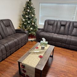 2 recliner sofas and 1 recliner chair  apostolic  Brown Faux leather, wipe clean, each sofa / chair has 2 cup holders on the arms,  middle of the sofa
