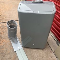 GE 7,500 Portable A/C + Window kit and remote