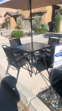 glass Patio Table with Umbrella And Chairs