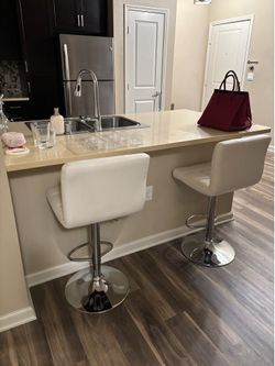White leather bar stools