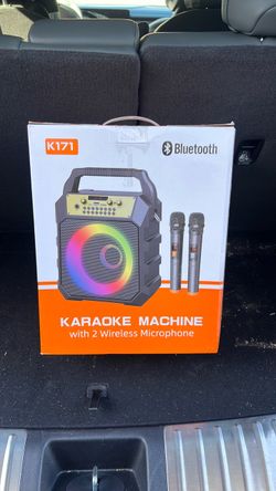 Karaoke machine with two wireless microphones