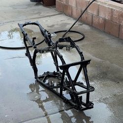 06 Trx 450r frame with black powder coat and pink slip
