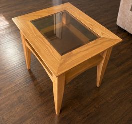 Wooden coffee table with glass inlet top