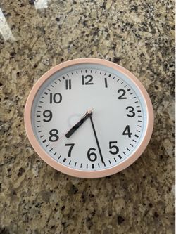 Pink wall clock