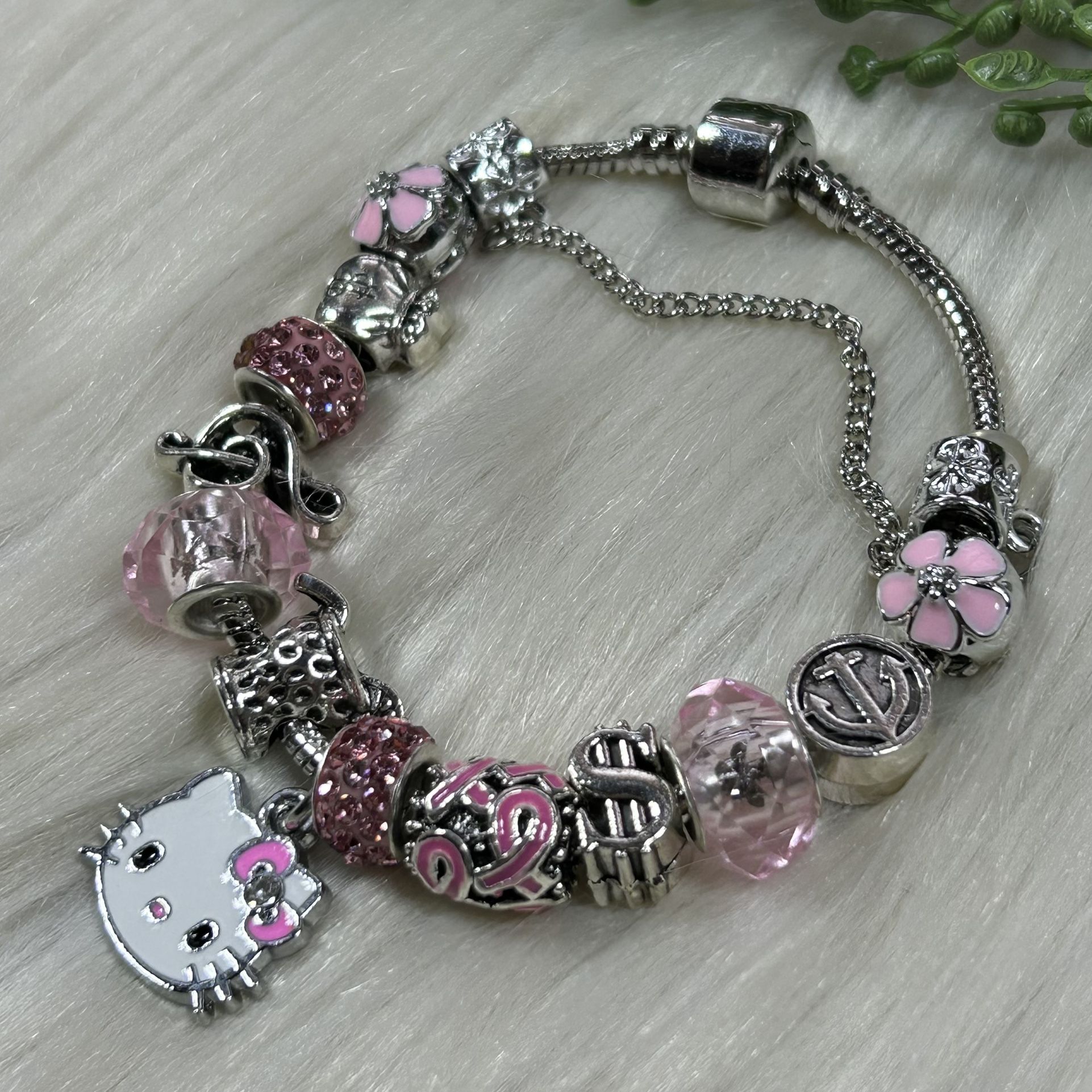 Hello Kitty multiple charms silver tone bracelet