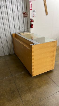 Store counter with glass top display  32x79x40”  - great shape