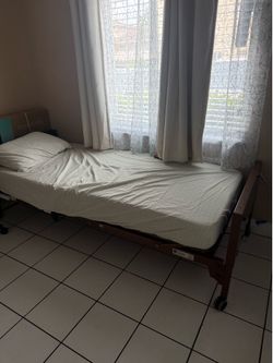 Hospital bed perfect condition- with very good mattress included
