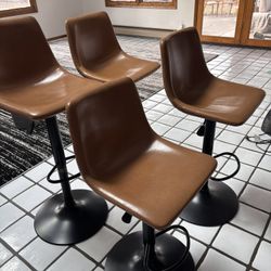 4 Adjustable Swivel Barstools 