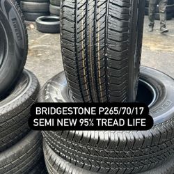 SET OF FOUR USED TIRES 265/70/17 BRIDGESTONE 