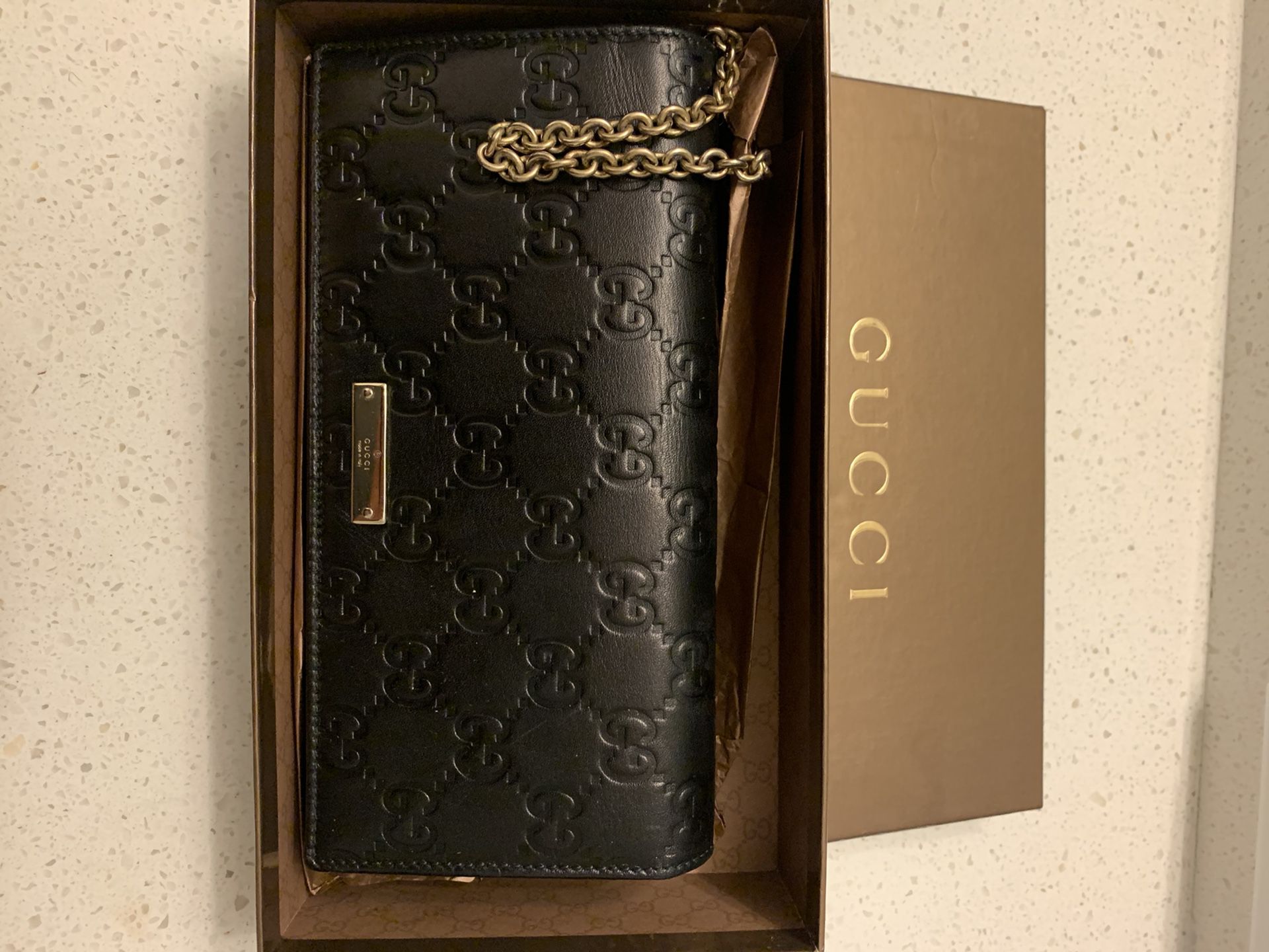Gucci clutch wallet