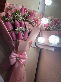 Pink tulips with carnations bouquet