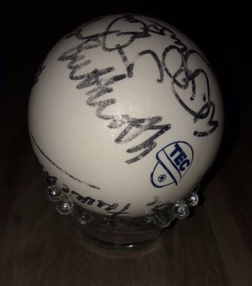 COLLECTIBLE SIGNED POLO PLAYER BALL WITH GLASS BUBBLE STAND