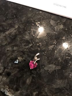 Custom heart pendant with small diamond and red ruby