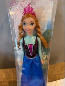 Frozen   Anna doll. New in package. 11 inches tall.