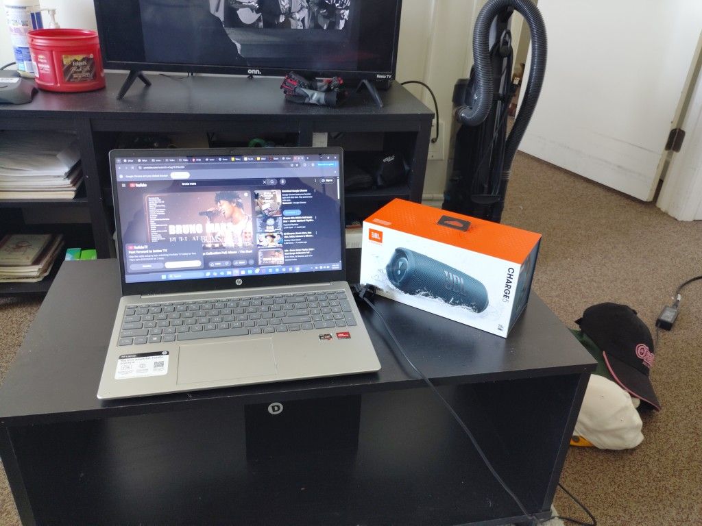 touch screen hp laptop and brand new charge 5 wireless speaker