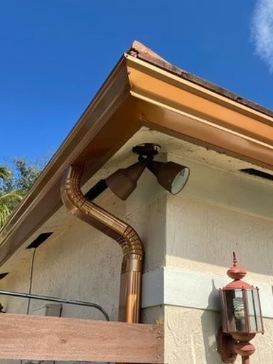 Hurricane Shutters / Rain Gutters