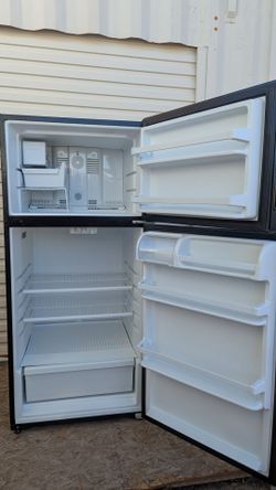 Black Amana Refrigerator - 
Works Great - 
Delivery Available
